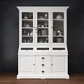 White Sideboard with Glass Doors Displaying Dinnerware Plates Bowls and Decorative Items