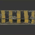 Worn Concrete Road Barrier With Yellow And Black Stripes For Traffic Safety