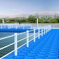 Scenic Blue Zigzag Bridge Over Water Surrounded by Trees and Green Grass