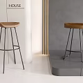 Modern Bar Stools With Wooden Seats And Metal Frames In Minimalist Interior Setting