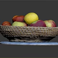 Fresh Assorted Fruits in Woven Basket with Colorful Apples and Lemon on Blue Cloth