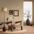Comfortable Accent Chair With Floor Lamp Side Table Framed Art and Vase on Wooden Floor