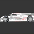 Audi White Race Car With Red Accents And Aerodynamic Design Features