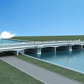 Scenic Bridge With Lampposts Over Calm Water Green Grass Path And Blue Sky