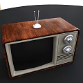 Vintage Television With Wooden Case Antenna And Classic Knobs On Front Panel