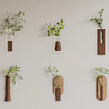 Creative Wall Decor with Green Plants in Wooden and Metal Hanging Plant Holders