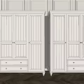 White Classic Wardrobes with Paneled Doors and Drawers on Wooden Floor and White Walls