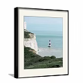 Scenic Landscape Painting with White Cliffs Green Grass and Red White Lighthouse Over Blue Sea