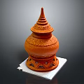 Orange Terracotta Architectural Tower With Intricate Carvings And Geometric Base