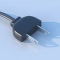 Black Square Household Appliance With Long Power Cord And Plug