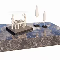 Decorative Ornament Set With Abstract Figure Sculptures And Tree Shaped Ornaments On Marble Platform
