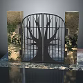 Iron Gate With Tree Design Between Stone Pillars And Green Plants