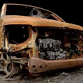 Rusted Damaged Van With Burnt Body And Broken Metal Parts