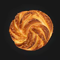 Freshly Baked Soft Golden Braided Bread Topped With Sesame Seeds