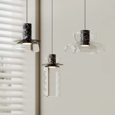 Three Modern Pendant Lights With Transparent Glass Shades And Marble Accent Bases For Contemporary Interior 3d model