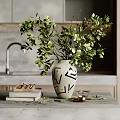 Stylish Decorative Ornament Set With Geometric Vase Green Leaves Books Small Cup On Kitchen Countertop