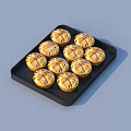 Ten Golden Round Pastries With Crisscross Patterns On Black Serving Tray