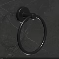 Black Round Ring Metal Door Handle On Dark Gray Cracked Textured Wall