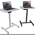 Rolling Mobile Desks With White And Black Stands And Laptops On Top