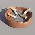 an ashtray with cigarettes 3d model