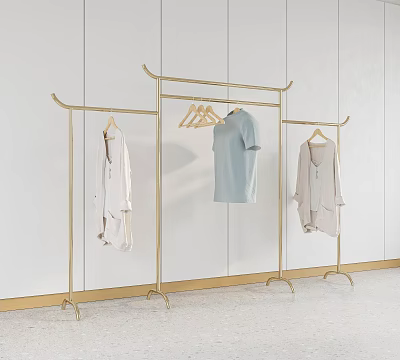 Golden Metal Clothes Racks With White Shirt Light Blue T Shirt And Light Colored Cardigan 3d model