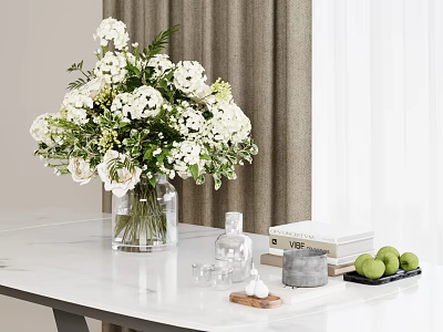 White Flowers In Clear Glass Vase On White Table With Books And Green Fruits 3d model