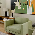 Bright Modern Living And Dining Room Interior With Green Sofa Coffee Table Artwork And Plant