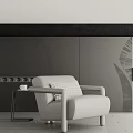 Minimalist Lounge Chair With Plaid Pillow Small Side Table And White Cup In Dark Wall Room