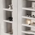 Modern White Storage Shelf Cabinet With Multiple Shelves Small Lamps And Decorative Items