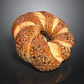 Fresh Baked Golden Brown Round Bread With Sesame Seeds And Crusty Texture