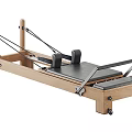 Yoga Studio Featuring Wooden Pilates Reformer with Adjustable Straps and Wheels