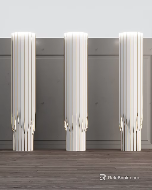 Three Modern Decorative Columns With Vertical Lines Against Gray Wall 3d model