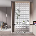 Modern Entryway Design With Glass Block Wall Black Countertop Green Plant and Pebble Floor