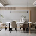 Modern Restaurant Interior With White Dining Table Upholstered Chairs Pendant Lights And Decorative Plants