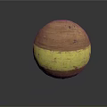 Round Brown Food Ball With Yellow Stripe And Spotted Surface Details