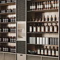 Wooden Display Shelves With Layered Storage For Wine Bottles And Boxed Items