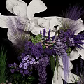 Elegant White Sculpture Decorated With Purple Flowers And Green Plants