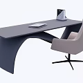 Modern Gray Curved Office Desk With Notebook And Beige Swivel Chair