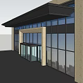 Modern Commercial Storefront With Large Glass Windows Light-Colored Pillars And Metal Frames