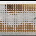 Modern Sofa Background Wall Design with Golden Dots Grid Arrangement Metal Frame and Green Plant