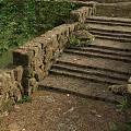 Rustic Stone Bridge With Stone Steps In Wooded Area Near Water 3d model