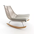 Comfortable Leisure Rocking Chair With Woven Backrest Light Gray Cushion And Wooden Rocking Legs