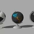Three Globe Themed Decorative Ornament Set with Diverse Color Patterns and Stand Bases