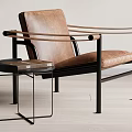 Modern Brown Leather Accent Chair With Black Metal Frame Curved Armrests And Side Table