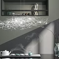 Cozy Tea Table and Chairs With Teapot Teacups Steam Branch Chandelier and Gray Wall