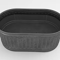 Black Oval Metal Garden Planter With Vertical Stripes For Outdoor Gardening