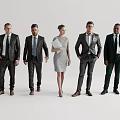 Five Business Professionals in Formal Attire Standing Together Against Grey Background