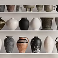 Diverse Ceramic Vessels With Various Shapes And Designs Displayed On Shelves