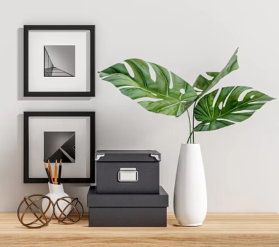 Modern Decorative Ornament Collection With Black Framed Pictures White Vase Monstera Leaves And Wooden Tabletop 3d model