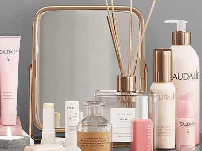 Modern Bathroom Accessories With Gold Frame Mirror Reed Diffuser And Skincare Bottles 3d model